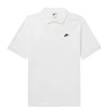 White Nike polo shirt with a black logo on the left chest.