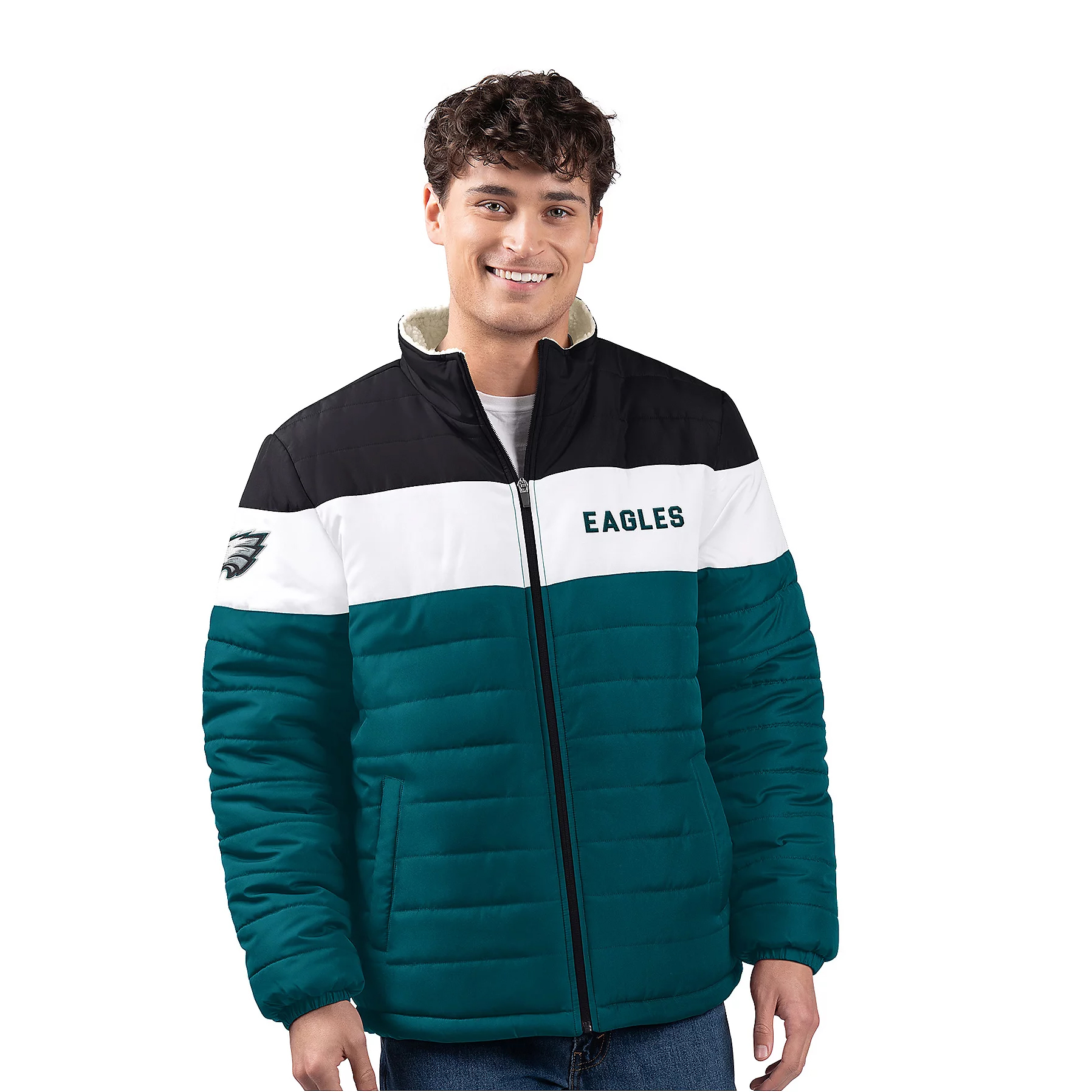 Sherpa-lined jacket with \“EAGLES\“ text and logo, featuring a color block design in black, white, and teal, with a zip closure and two front pockets.
