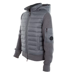 A gray puffer jacket with a hood, featuring quilted body panels and knit sleeves. The design includes a ribbed cuff and a utility pocket on the left arm.