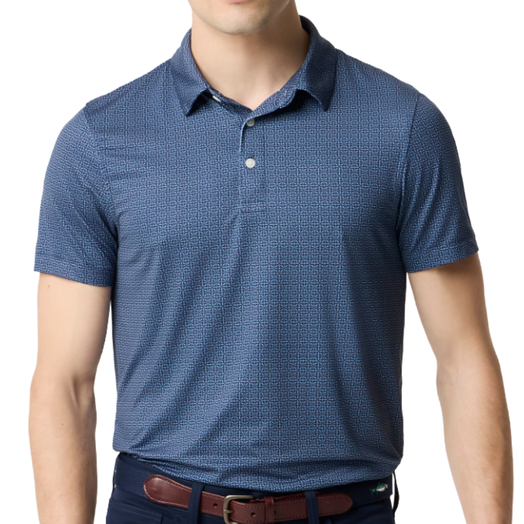 A blue patterned short-sleeve polo shirt paired with dark pants and a brown leather belt.