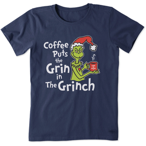 Navy blue T-shirt featuring a cartoon character with a Santa hat, holding a mug. Text reads, \“Coffee Puts the Grin in The Grinch\“ with the mug labeled \“Life is Good.\“