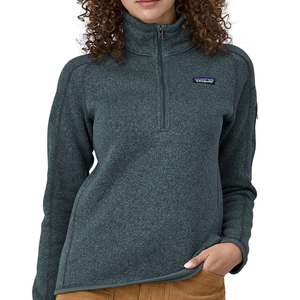 Patagonia Better Sweater is a dark gray, quarter-zip pullover with a soft, heathered knit exterior and a fleece interior. It features a small logo on the chest and raglan sleeves for comfort and mobility.
