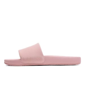 A pink Lululemon slide sandal with an embossed logo, featuring a wide single strap and flat sole.