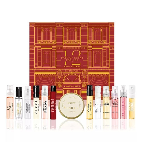a variety of perfume samples in front of a red box