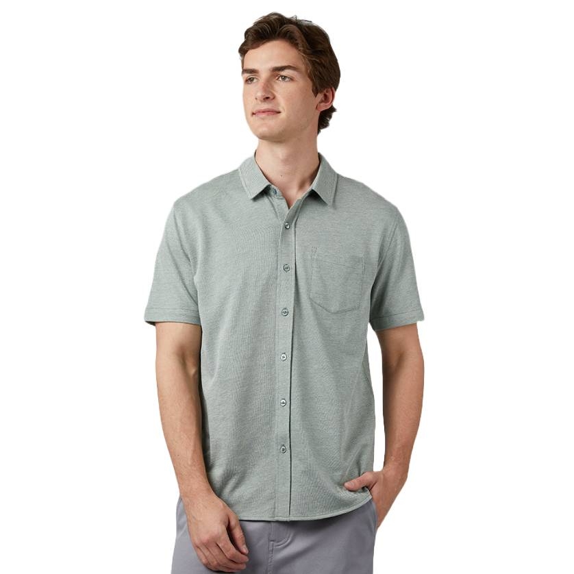 32 Degrees Casual Knit Shirts feature a lightweight, short-sleeve design with a button-up front and a single chest pocket, suitable for comfortable, everyday wear.