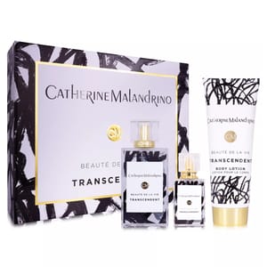 Catherine Malandrino Beauté de la Vie Transcendent gift set includes a perfume bottle, a smaller perfume, and a body lotion, all with black and white abstract designs.