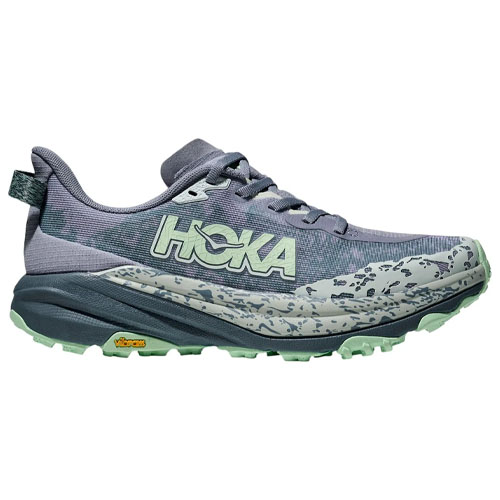 Hoka trail running shoe featuring a gray and light green design with a cushioned sole and Vibram outsole for traction.