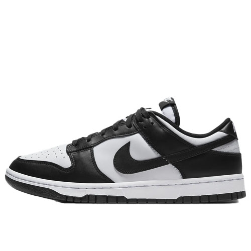 A pair of Nike Dunk Low sneakers featuring a black and white colorway with a black swoosh, white toe box, and black laces.