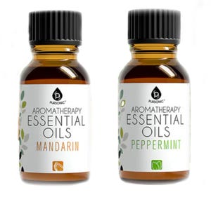 42-pack Aromatherapy Essential Oils with scents including Mandarin and Peppermint, suitable for various uses such as enhancing relaxation and well-being. Each bottle is made of amber glass with black caps and features clear labeling.