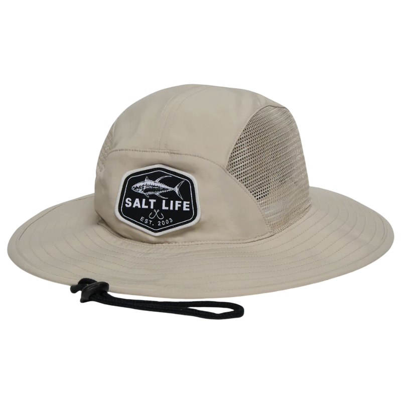 A beige wide-brimmed hat with mesh ventilation on the sides, featuring a \“Salt Life\“ patch displaying a fish graphic and \“Est. 2003.\“