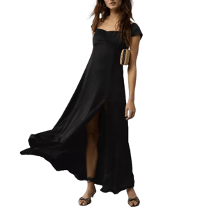 Black satin maxi dress with a sweetheart neckline and cap sleeves, featuring a front slit. It’s paired with strappy sandals and a small clutch bag.