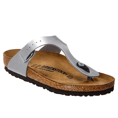 A silver thong-style sandal with a cork footbed and black rubber sole, marked with the brand name, offering adjustable straps for comfort and support.