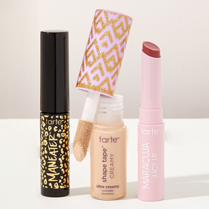 Three Tarte cosmetics: Maneater mascara, Shape Tape ultra creamy concealer, and Maracuja Juicy Lip.