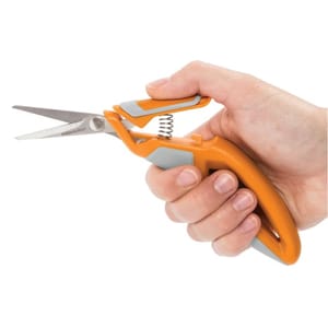 Fiskars Precision Scissors feature an ergonomic orange and gray handle with a spring-action design for reduced hand fatigue. The stainless steel blades provide precise cutting, ideal for crafting and detailed work.