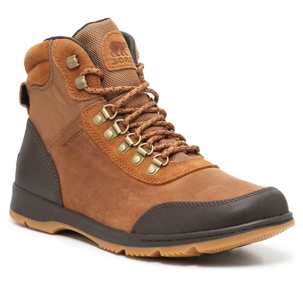 Brown and black Sorel Ankeny hiking boots with metal eyelets, a high-top design for ankle support, waterproof construction, and a contrasting light brown outsole.